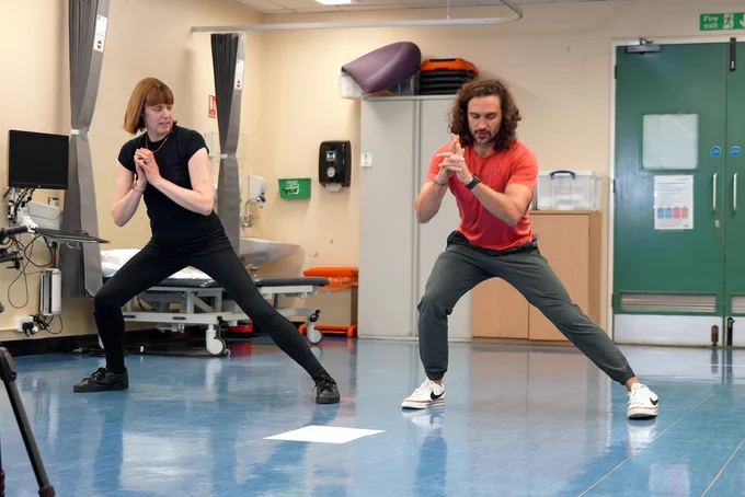 Photo of Carol Webb and Joe Wicks taking part in a workout