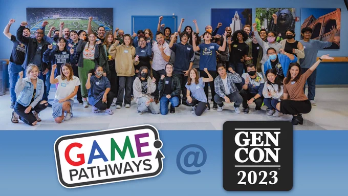 A group photo of Game Pathways students and instructors cheering. A title on the image says "Game Pathways @ Gen Con 2023."