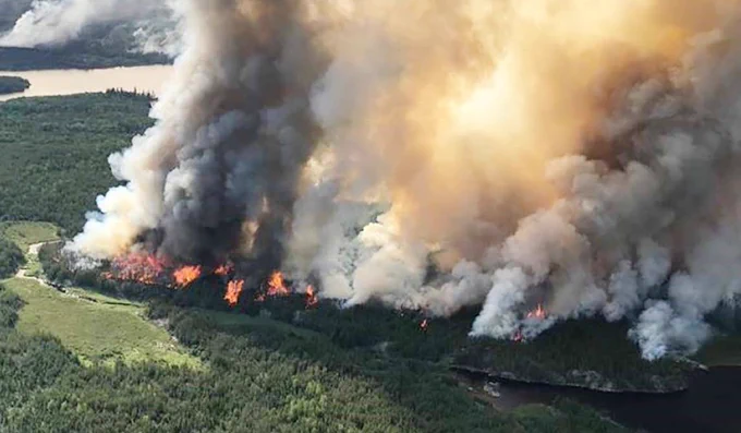 A raging forest fire in Northern Ontario (photo via CTV News)