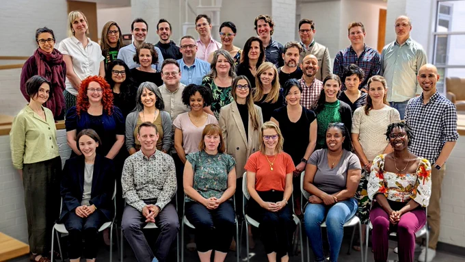 A group photo of the National Humanities Center's 2023 Summer Residents. 