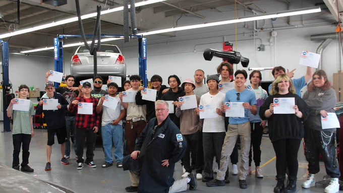 PSSC automotive students posing for photo with their certifications