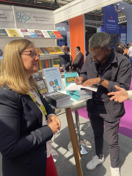 Image of Michelle Parry-Slater and Nelson Sivalingam with their books The Learning and Development Handbook and Learning at Speed