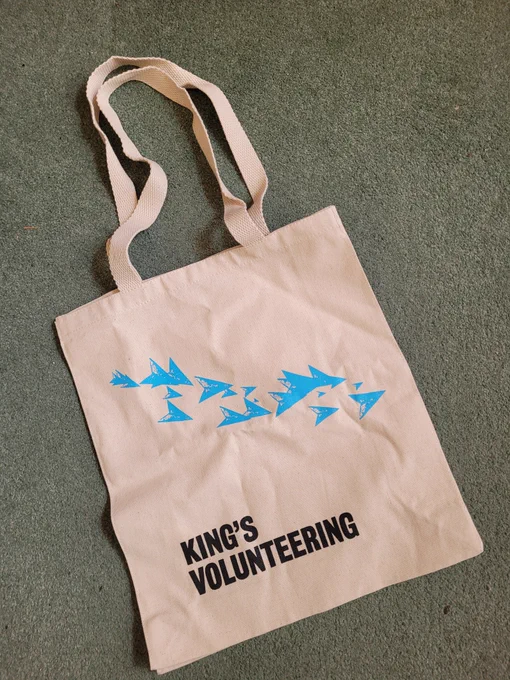 Tote bag with King's volunteering written on it.