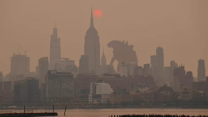 A city with the sky red from smoke, Godzilla is walking behind the skyscrapers