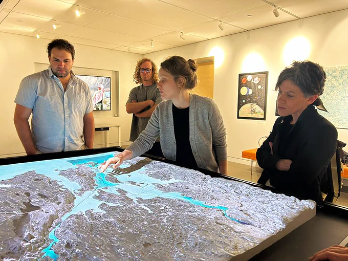 Left to right: Aaron Bugaj of University of Arizona's Biosphere 2, Stewart Copeland, Georgia Rhodes, and Nicole Antebi of the University of Arizona. Aaron & Nicole were visiting as part of a travel grant to see how science visualization is being created at institutions across the U.S. Photo by Shaun Kirby