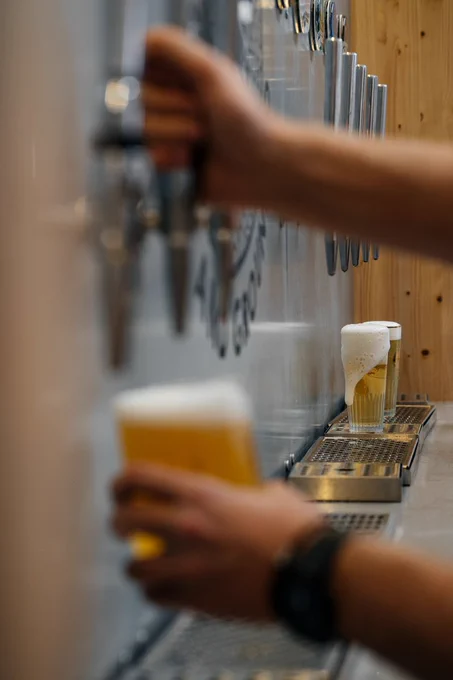 Beers pouring on tap at the taproom