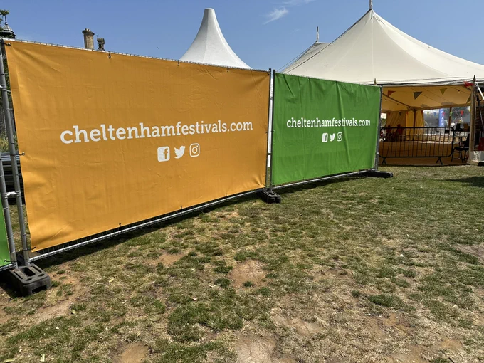 Cheltenham Festival banners at entrance to site