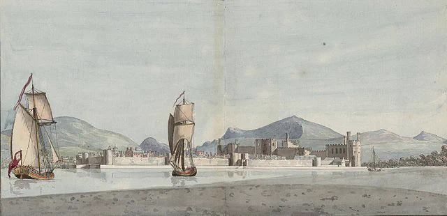 Caernarvon castle and town, with boats in the foreground, and a mountainous landscape to the rear. Watercolour. An image from Thomas Pennant's extra-illustrated Welsh tours, held by the National Library of Wales / Llyfrgell Genedlaethol Cymru.