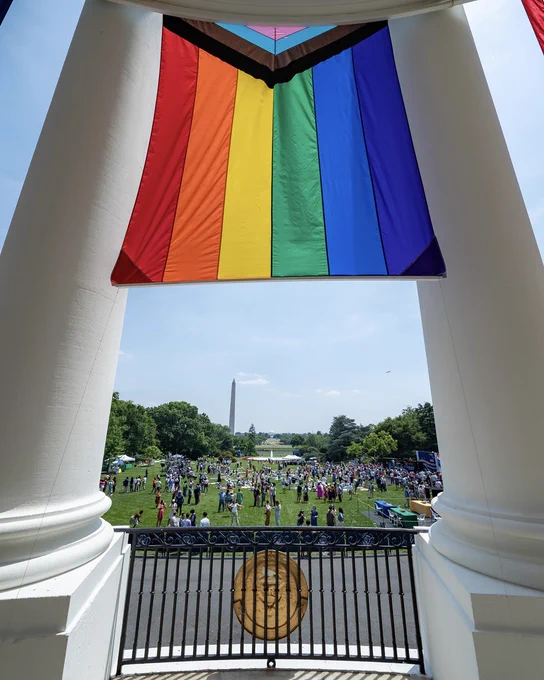 A Pride flag hangs above the South Lawn.