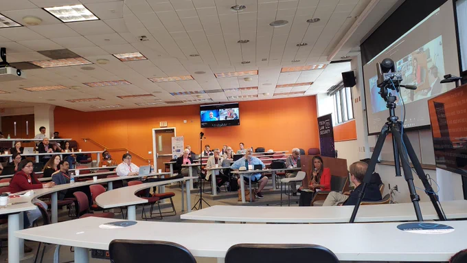 Photo of some of the audience and panelists at the North American School of Internet Governance during the 2023 NASIG event at American University.