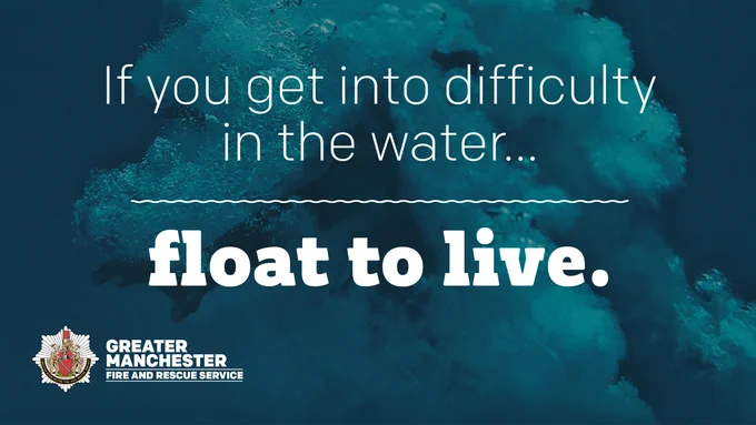 If you get into difficulty in the water, float to live. Image shows underneath the water when someone has jumped in.