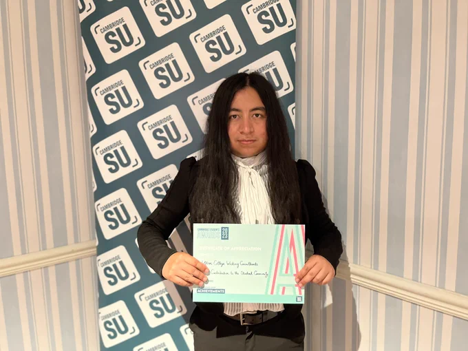 Consultant holding certificate.