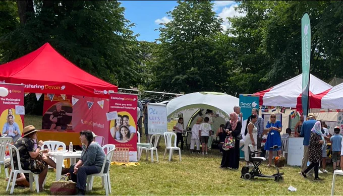 Picture taken at a distance of the Devon County Council and Fostering Devon Stands.