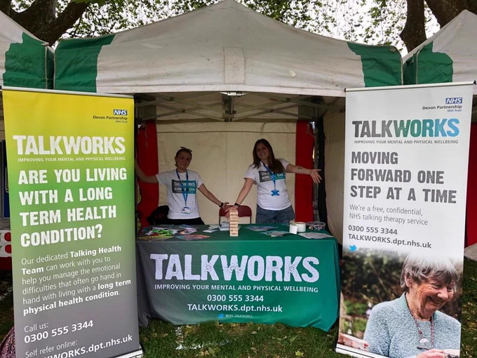 Three TALKWORKS therapists are pictured at Exeter Respect Festival