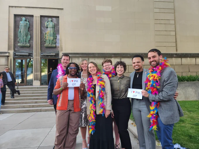 Tana Pierro and Deionte Harrilla-Gray pose with other members of the Pitt community at the Allies for Health   Wellbeing Ball