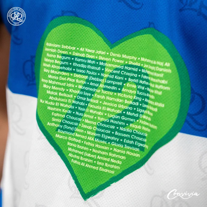 A QPR shirt bearing a green heart with names of each of the 72 who died in the Grenfell Tower fire.
