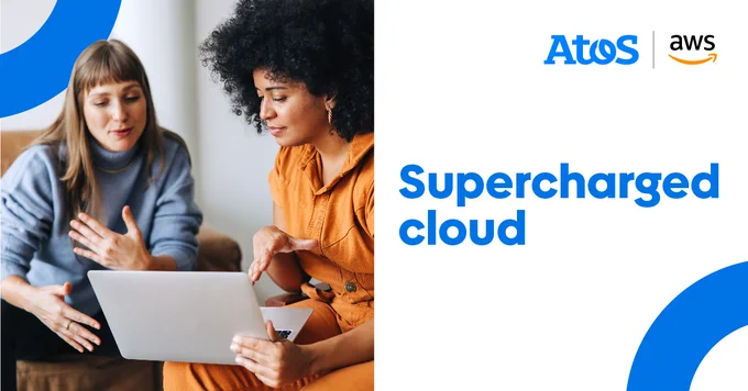 Two women looking at a laptop screen and discussing. Title: Supercharged cloud