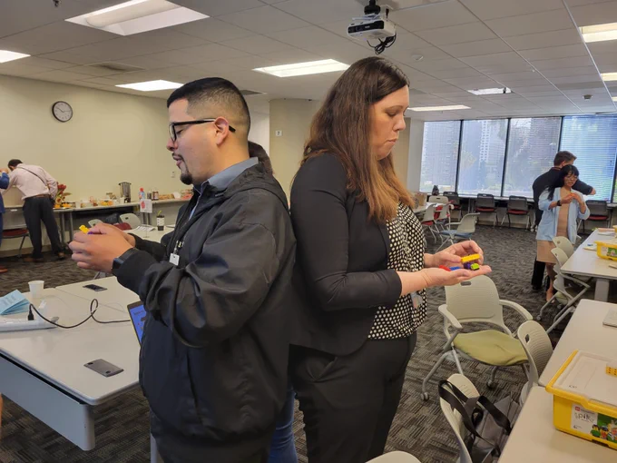 Educators participating in a LEGO building inclusion activity