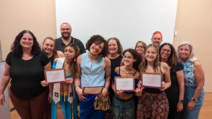 Four scholarship winners and the FOTT board of directors