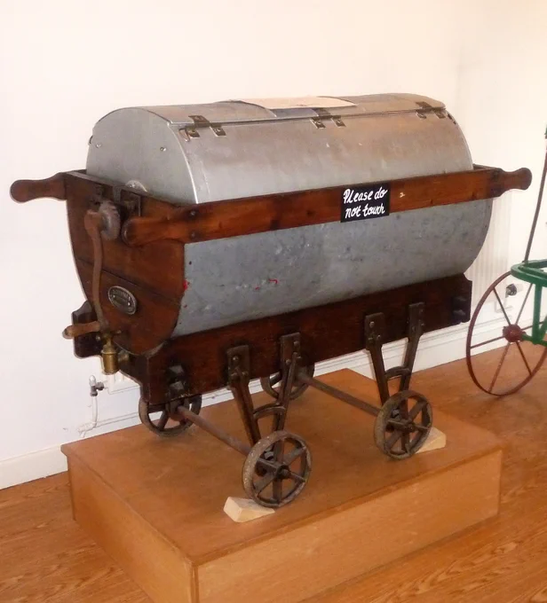 Colour photo of the cheesemaker on display