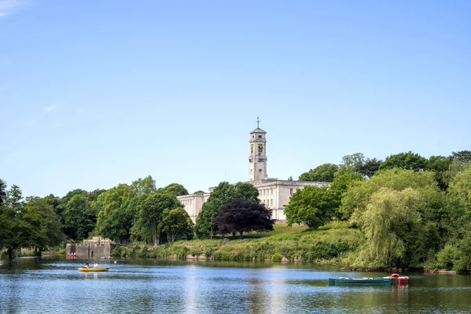 External view of the University of Nottingham Trent Building, looking over the Highfields Park lake.