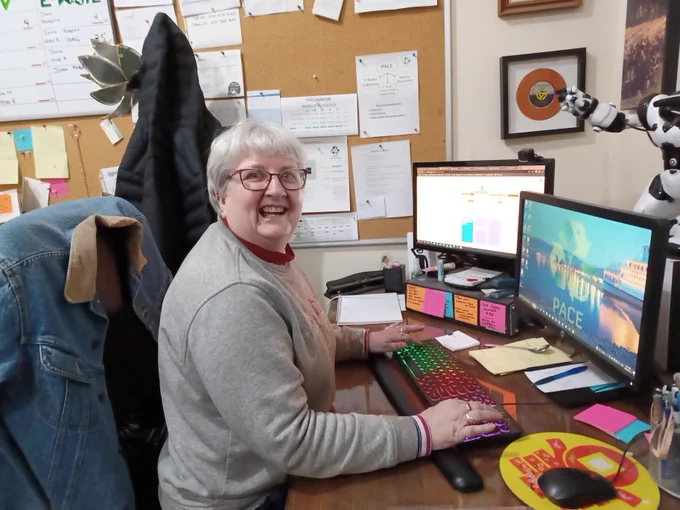 Distance Computer Comfort participant Jill smiling while using the computer.