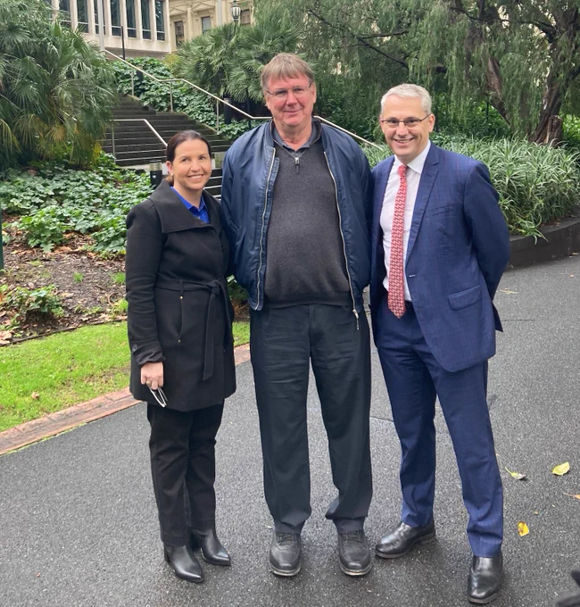 TAC rep Joanne van Berkel, lived experience volunteer Tony and Minister for WorkSafe and TAC Danny Pearson at today's media event in Melbourne.
