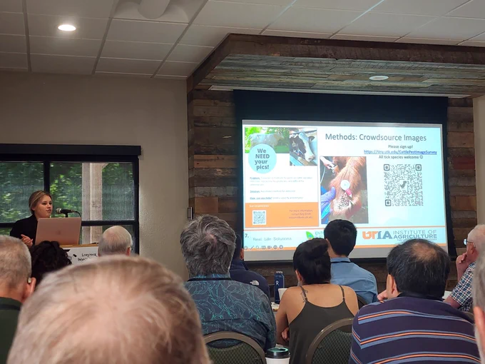 Kary Smith, PhD student, presenting her research to the LIWC audience and requesting help from the audience to make monitoring, surveillance, and science easier.