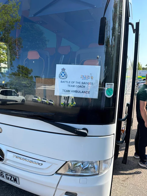 Front of team bus with SAS display