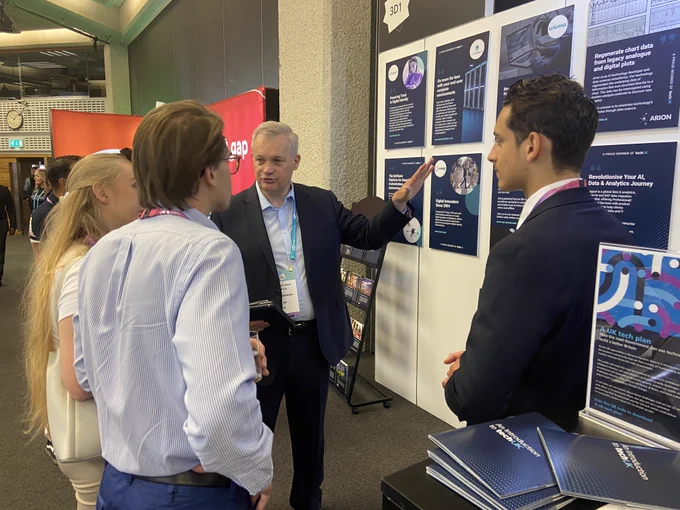 Image shows Mvine's team in conversation with two people attending the event as part of a delegation from Austria visiting London Tech Week on Tuesday 13 June 2023. Photo by Alex Smith. Copyright. All rights reserved. Used here with kind permission. 