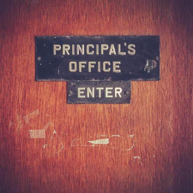 Door with text "Principal's office Enter"