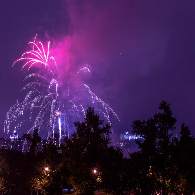 Pink and purple fireworks over the city of Pittsburgh