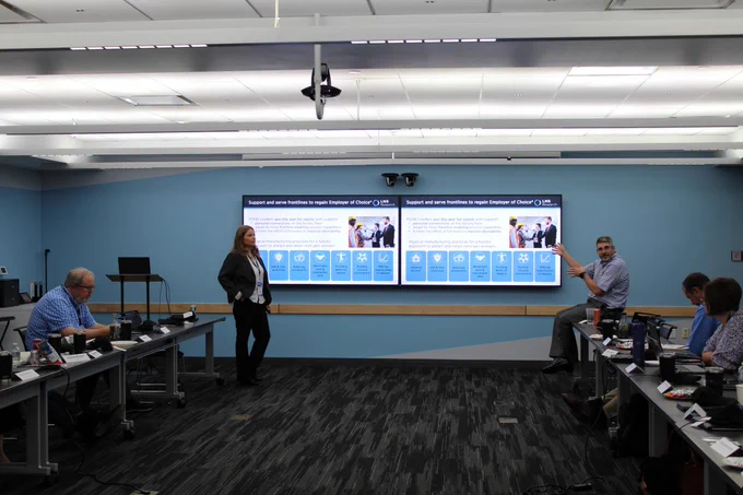 LNS Research Analyst Allison Kuhn and Michael Carroll of Georgia Pacific presenting at the LNS Research Exemplar Event on June 13-14, 2023.