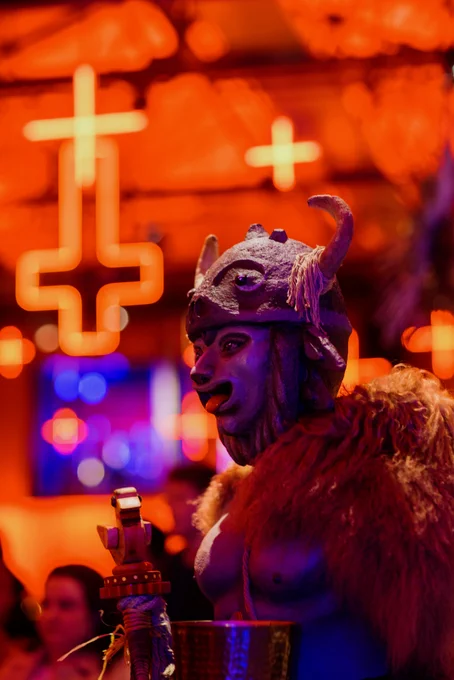 A fur-clad clay bust of Radegast, Slavic god of beer (and some other stuff) wears a horned helmet and sticks his tongue out at the Moo Brew stall at Dark Mofo's Winter Feast.