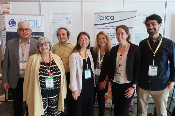 Group picture taken at ESPCI2023 of the MOSAICS ESRs, MOSAICS supervisor Prof. Wendy Huinck and EURO-CIU members Teresa Amat (President) and Robert Mandara (Vice-President), both pictured left.