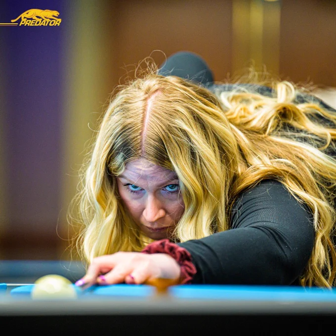 Brittany "The Bombshell" Bryant, Canadian Pool Player, competing in a professional pool tournament.
