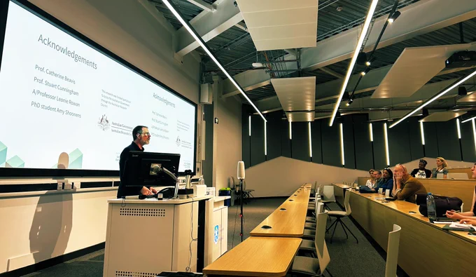 Professor Michael Dezuanni presents to an audience in a lecture theatre