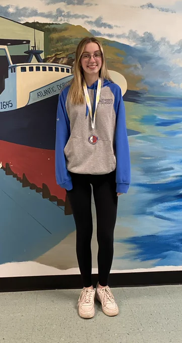 Maria S pictured with her Sportsmanship Medal.