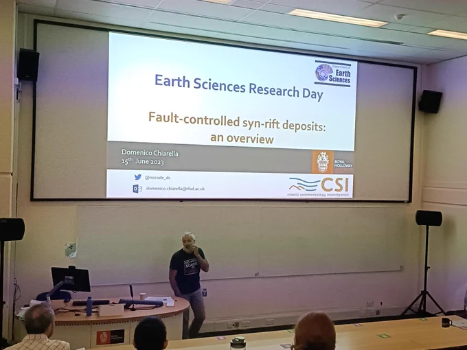 Photo of me presenting an overview of fault-controlled deposits