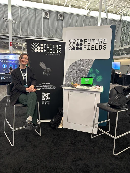 Future Fielder Laine sits at the Future Fields booth at ISSCR 2023