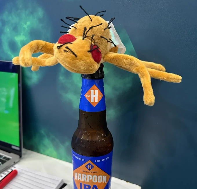 Future Fields mascot, Mel the drosophila melanogaster (fruit fly), enjoys a cold beer
