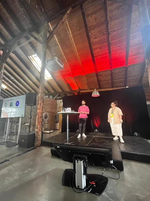 Danny and Molly on stage presenting on accsssibility