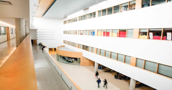 Bright and open atrium in Victor Phillip Dahdaleh Building.