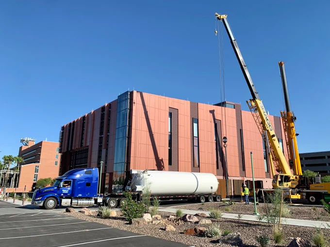 Large liquid nitrogen tank arriving on the bed of a large truck