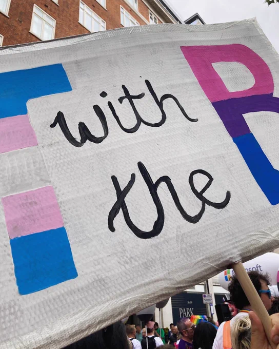 Placard: “T with the B”