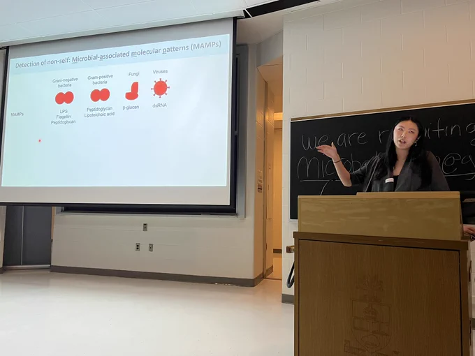Cynthia Guo giving a talk about innate immunity.