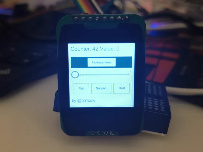 The screen shows a text label, a button that increases the counter, a slider, and three buttons in a row.