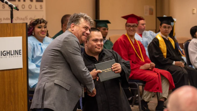 Student receiving diploma