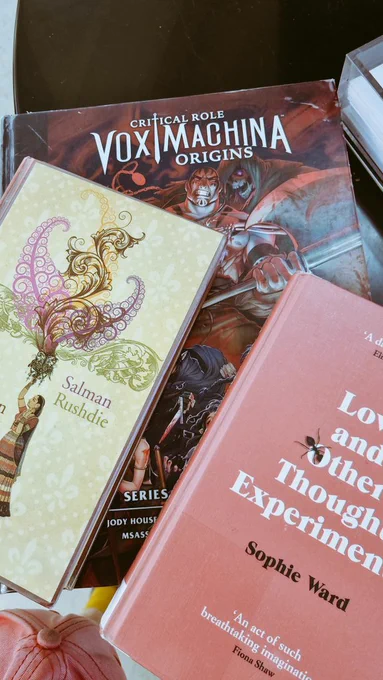 Three books in a pile. 