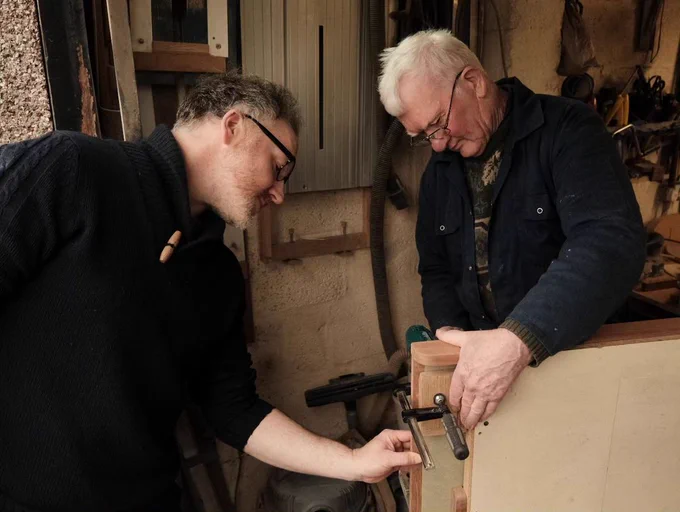 Gareth and Tom (Dad) from FlickForKicks building a 5-a-side table together in their home workshop